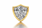 Close-up of the Aggie Shield diamond in a gold bezel setting.